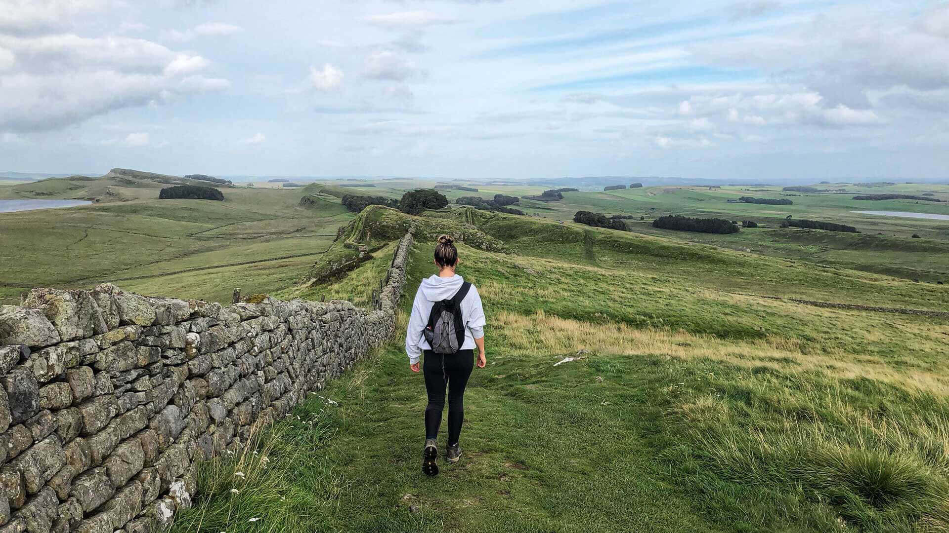 Woman walking in Northumberland National Park